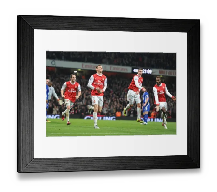 Framed Print : Arsenal's Koscielny, Djourou, Fabregas, and van Persie: Celebrating a 3:0 (3:1 agg) Carling Cup Semi-Final Victory over Ipswich Town Framed Print : Arsenal's Koscielny, Djourou, Fabregas, and van Persie: Celebrating a 3:0 (3:1 agg) Carling Cup Semi-Final Victory over Ipswich Town