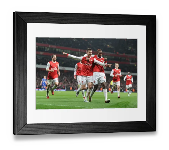 Framed Print : Arsenal's Carling Cup Triumph: Koscielny, Djourou, and Fabregas Celebrate Second Goal (3:0, 3:1 agg) Framed Print : Arsenal's Carling Cup Triumph: Koscielny, Djourou, and Fabregas Celebrate Second Goal (3:0, 3:1 agg)