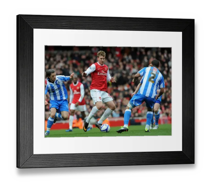 Framed Print : Nicklas Bendtner (Arsenal) Lee Peltier (Huddersfield). Arsenal 2: 1 Huddersfield Town Framed Print : Nicklas Bendtner (Arsenal) Lee Peltier (Huddersfield). Arsenal 2: 1 Huddersfield Town