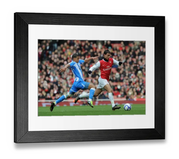 Framed Print : Marouane Chamakh (Arsenal) Lee Peltier (Huddersfield). Arsenal 2: 1 Huddersfield Town Framed Print : Marouane Chamakh (Arsenal) Lee Peltier (Huddersfield). Arsenal 2: 1 Huddersfield Town