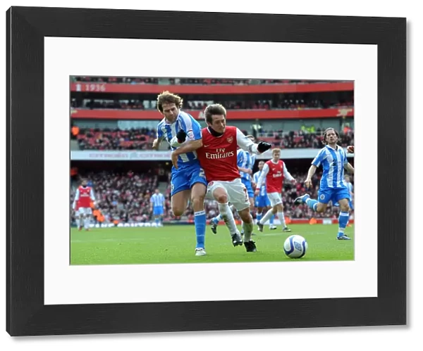 Tomas Rosicky (Arsenal) Kevin Kilbane (Huddersfield). Arsenal 2: 1 Huddersfield Town