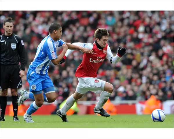 Tomas Rosicky (Arsenal) Lee Peltier (Huddersfield). Arsenal 2: 1 Huddersfield Town