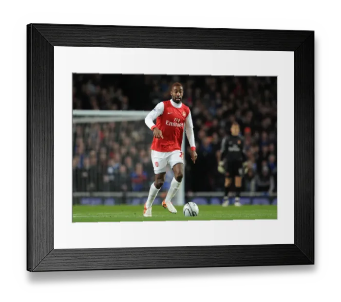Framed Print : Arsenal's Johan Djourou Celebrates in Emirates Stadium after Securing a 3-0 Win over Ipswich Town in the Carling Cup Semi-Final Second Leg