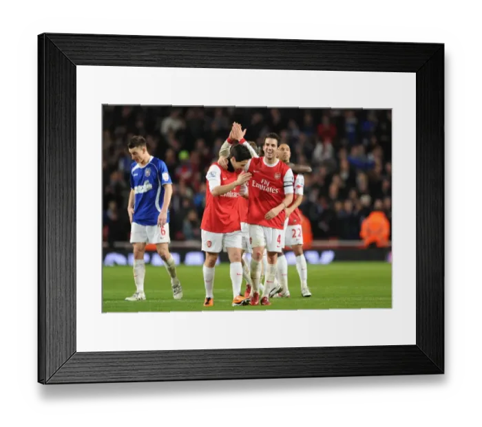 Framed Print : Cesc Fabregas and Samir Nasri (Arsenal) celebrate at the end of the match