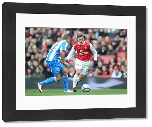 Andrey Arshavin (Arsenal) Jack Hunt (Huddersfield). Arsenal 2: 1 Huddersfield Town
