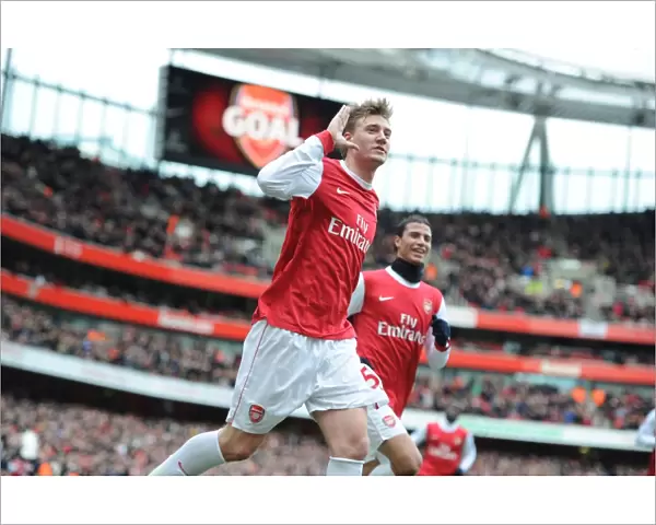 Nicklas Bendtner celebrates scoring the 1st Arsenal goal. Arsenal 2: 1 Huddersfield Town