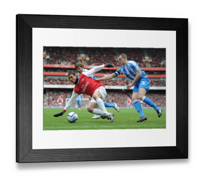 Framed Print : Marouane Chamakh (Arsenal) Peter Clarke (Huddersfield). Arsenal 2: 1 Huddersfield Town