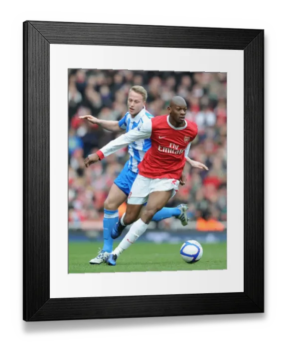 Framed Print : Abou Diaby (Arsenal) Lee Peltier (Huddersfield). Arsenal 2: 1 Huddersfield Town