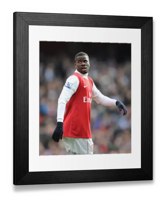 Framed Print : Emmanuel Eboue (Arsenal). Arsenal 2: 1 Huddersfield Town, FA Cup Fourth Round Framed Print : Emmanuel Eboue (Arsenal). Arsenal 2: 1 Huddersfield Town, FA Cup Fourth Round