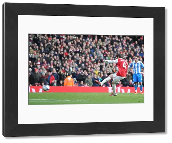 Cesc Fabregas shoots past Huddersfield goalkeeper Ian Bennett from the penalty spot to score the 2nd Arsenal goal. Arsenal 2: 1 Huddersfield Town, FA Cup Fourth Round, Emirates Stadium, Arsenal Football Club, London, 30  /  1  /  2011. Credit : Stuart MacFarlane  /  Arsenal