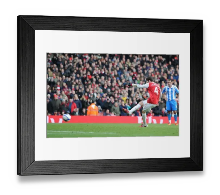 Framed Print : Cesc Fabregas shoots past Huddersfield goalkeeper Ian Bennett from the penalty spot to score the 2nd Arsenal goal. Arsenal 2: 1 Huddersfield Town, FA Cup Fourth Round, Emirates Stadium, Arsenal Football Club, London, 30  /  1  /  2011. Credit : Stuart MacFarlane  /  Arsenal