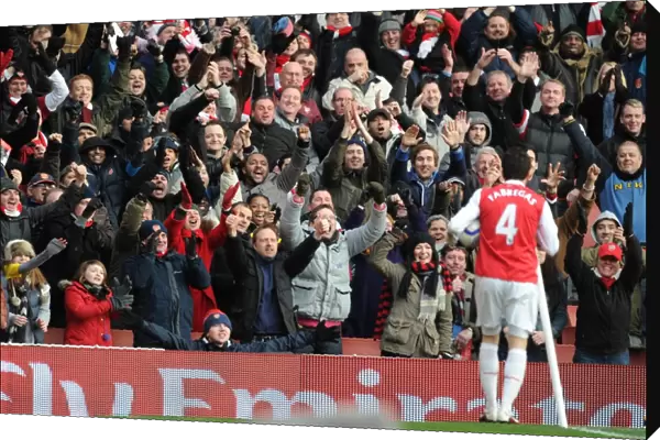 Cesc Fabregas celebrates scoring the 2nd Arsenal goal the the fans. Arsenal 2