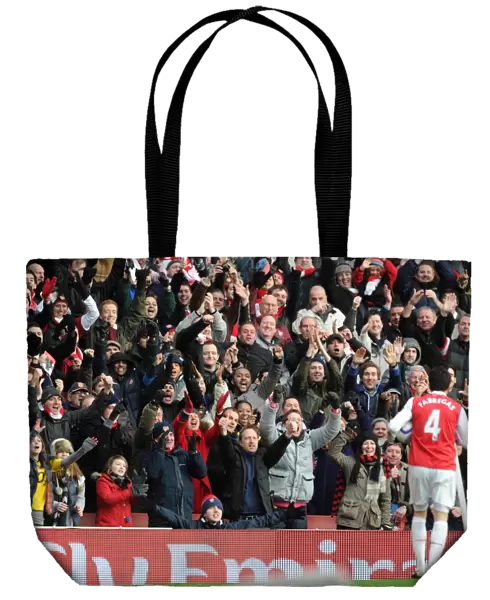 Cesc Fabregas celebrates scoring the 2nd Arsenal goal the the fans. Arsenal 2