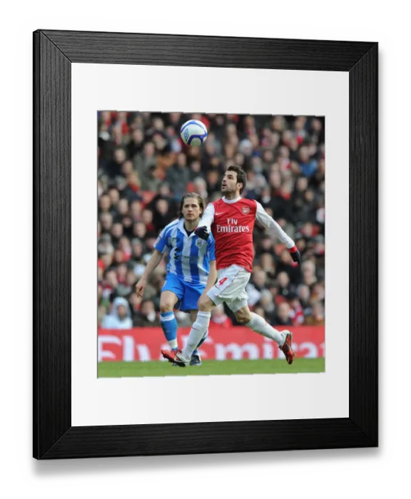 Framed Print : Cesc Fabregas (Arsenal) Joey Gudjonsson (Huddersfield). Arsenal 2: 1 Huddersfield Town