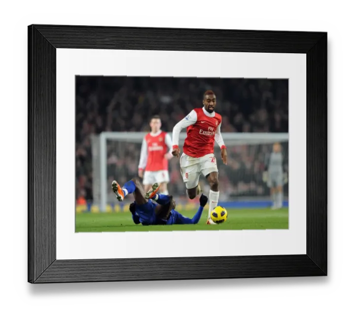 Framed Print : Johan Djourou (Arsenal) Louis Saha (Everton). Arsenal 2: 1 Everton. Barclays Premier League