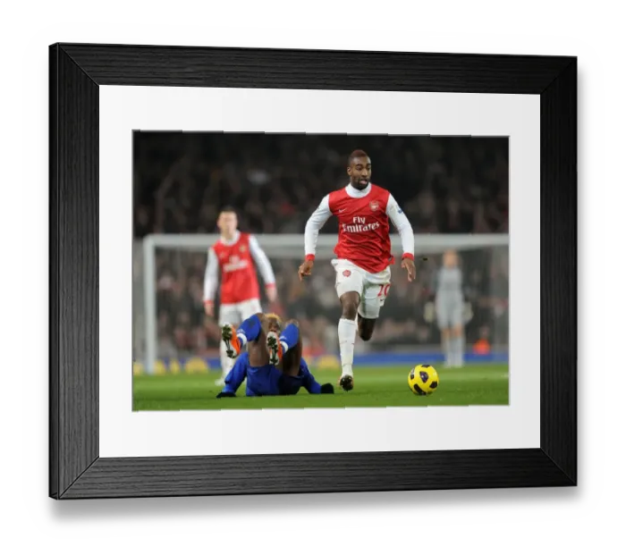 Framed Print : Arsenal's Djourou Beats Saha: 2-1 Victory Over Everton in Premier League Framed Print : Arsenal's Djourou Beats Saha: 2-1 Victory Over Everton in Premier League
