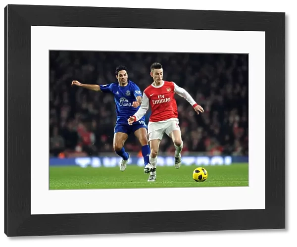 Laurent Koscielny (Arsenal) Mikel Arteta (Everton). Arsenal 2: 1 Everton