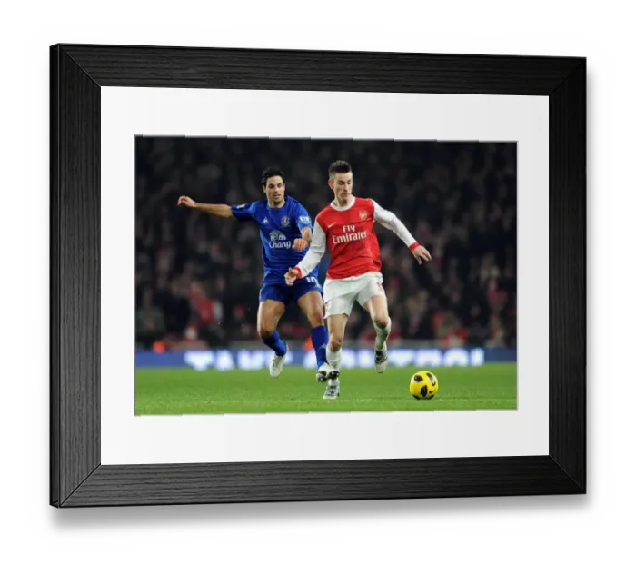Framed Print : Laurent Koscielny (Arsenal) Mikel Arteta (Everton). Arsenal 2: 1 Everton