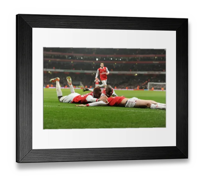 Framed Print : Laurent Koscielny celebrates scoring the 2nd Arsenal goal with Johan Djourou Framed Print : Laurent Koscielny celebrates scoring the 2nd Arsenal goal with Johan Djourou