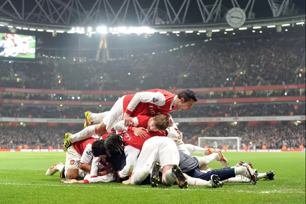 Arsenal's Koscielny and Teammates Celebrate 2:1 Victory Over Everton
