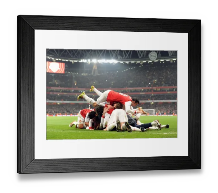 Framed Print : Arsenal's Victory: Koscielny and Teammates Celebrate Second Goal Against Everton (2-1) Framed Print : Arsenal's Victory: Koscielny and Teammates Celebrate Second Goal Against Everton (2-1)