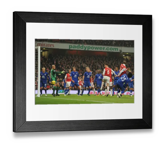 Framed Print : Laurent Koscielny heads past Everton goalkeeper Tim Howard to score the 2nd Arsenal goal Framed Print : Laurent Koscielny heads past Everton goalkeeper Tim Howard to score the 2nd Arsenal goal