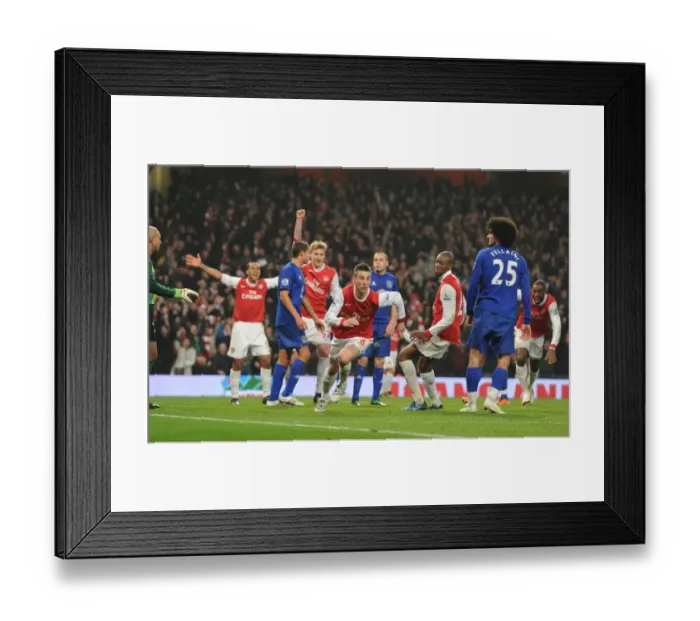 Framed Print : Koscielny's Strike: Arsenal Takes the Lead 2-1 over Everton
