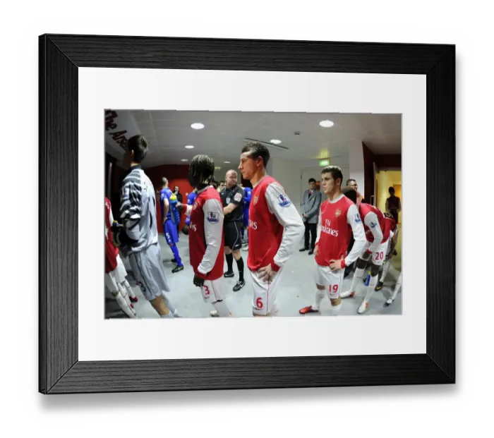 Framed Print : Laurent Koscielny and Jack Wilshere (Arsenal) wait to walk up the tunnel before the match