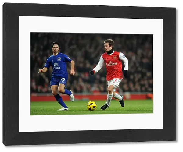 Tomas Rosicky (Arsenal) Mikel Arteta (Everton). Arsenal 2: 1 Everton. Barclays Premier League