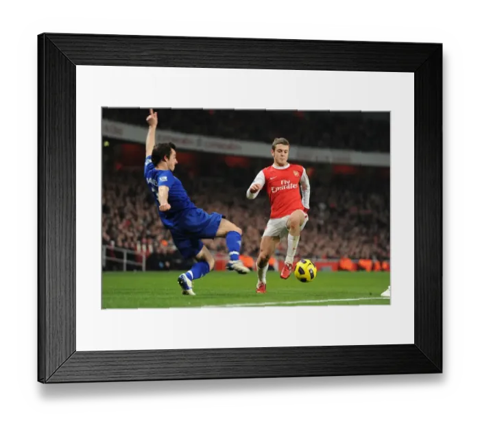 Framed Print : Jack Wilshere (Arsenal) Leighton Baines (Everton). Arsenal 2: 1 Everton Framed Print : Jack Wilshere (Arsenal) Leighton Baines (Everton). Arsenal 2: 1 Everton