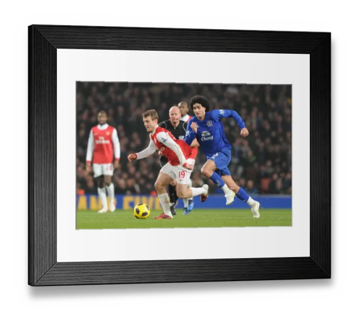 Framed Print : Jack Wilshere (Arsenal) Marouane Fellaini (Everton). Arsenal 2: 1 Everton