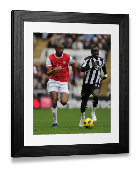 Framed Print : Unforgettable Rivalry: Diaby vs. Tiote in the Intense 4-4 Draw between Newcastle and Arsenal Framed Print : Unforgettable Rivalry: Diaby vs. Tiote in the Intense 4-4 Draw between Newcastle and Arsenal