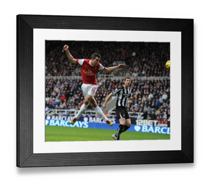 Framed Print : Robin van Persie heads past Newcastle goalkeeper Steve Harper to score the 4th Arsenal goal
