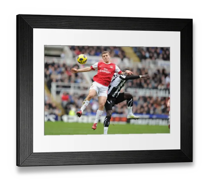 Framed Print : Unforgettable Rivalry: Wilshere vs. Tiote - The Intense 4-4 Battle: Arsenal vs. Newcastle United (2010-11) Framed Print : Unforgettable Rivalry: Wilshere vs. Tiote - The Intense 4-4 Battle: Arsenal vs. Newcastle United (2010-11)