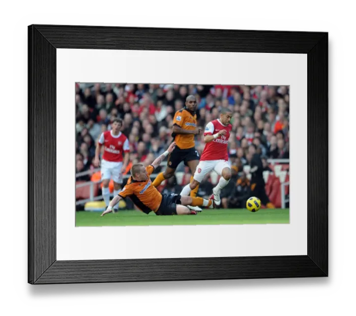 Framed Print : Gael Clichy (Arsenal) Jamie O Hara (Wolves). Arsenal 2: 0 Wolverhampton Wanderers Framed Print : Gael Clichy (Arsenal) Jamie O Hara (Wolves). Arsenal 2: 0 Wolverhampton Wanderers