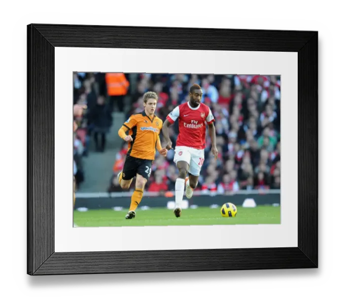 Framed Print : Johan Djourou (Arsenal) Kevin Doyle (Wolves). Arsenal 2: 0 Wolverhampton Wanderers Framed Print : Johan Djourou (Arsenal) Kevin Doyle (Wolves). Arsenal 2: 0 Wolverhampton Wanderers