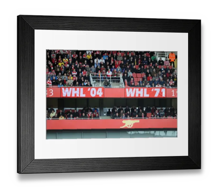 Framed Print : Fans banners in the stadium. Arsenal 2: 0 Wolverhampton Wanderers. Barclays Premier League