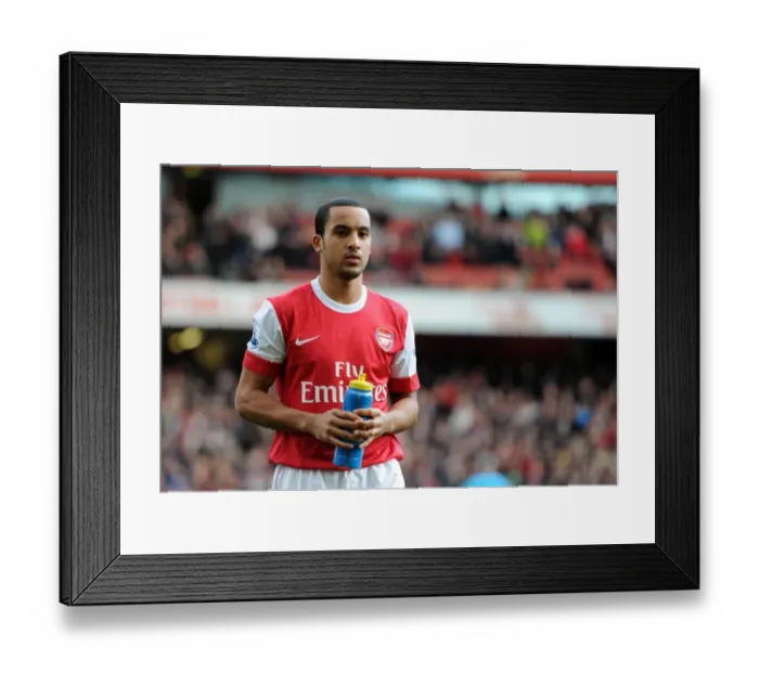 Framed Print : Theo Walcott's Brace: Arsenal Cruises Past Wolverhampton Wanderers 2-0 in Premier League