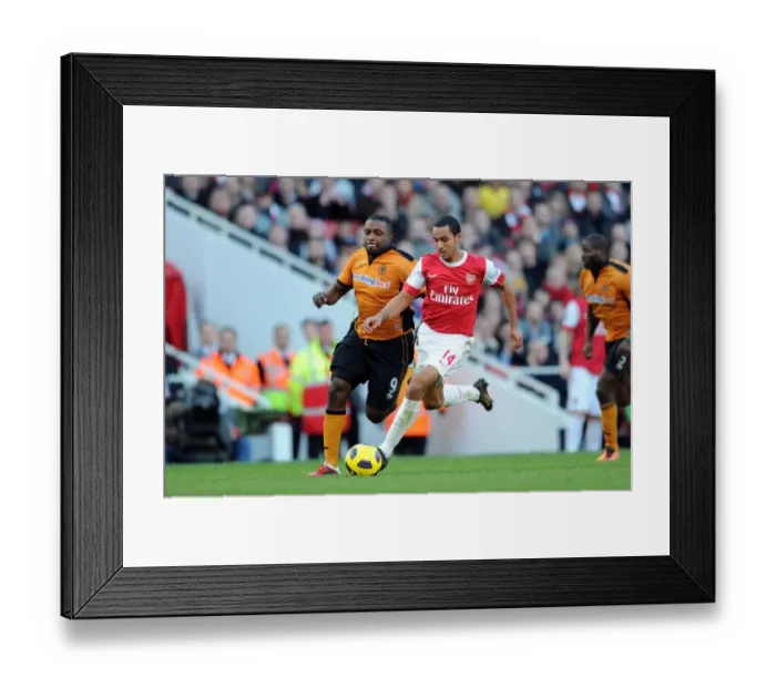 Framed Print : Theo Walcott (Arsenal) Sylvan Ebanks-Blake (Wolves). Arsenal 2: 0 Wolverhampton Wanderers