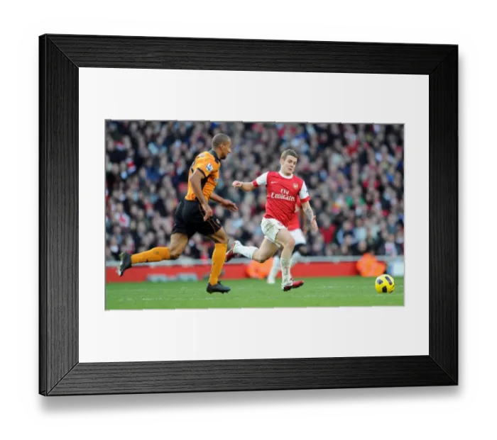 Framed Print : Jack Wilshere (Arsenal) Karl Henry (Wolves). Arsenal 2: 0 Wolverhampton Wanderers