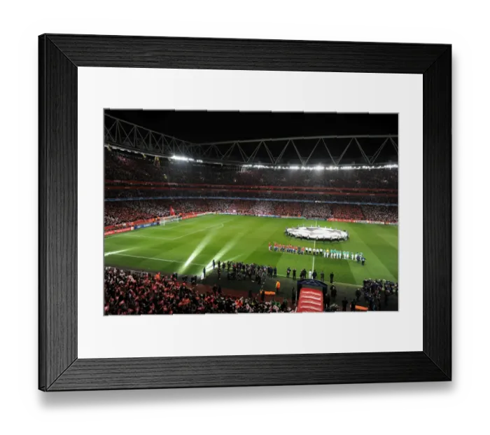 Framed Print : Arsenal vs. Barcelona: UEFA Champions League Showdown at Emirates Stadium (2:1 in Favor of Arsenal)