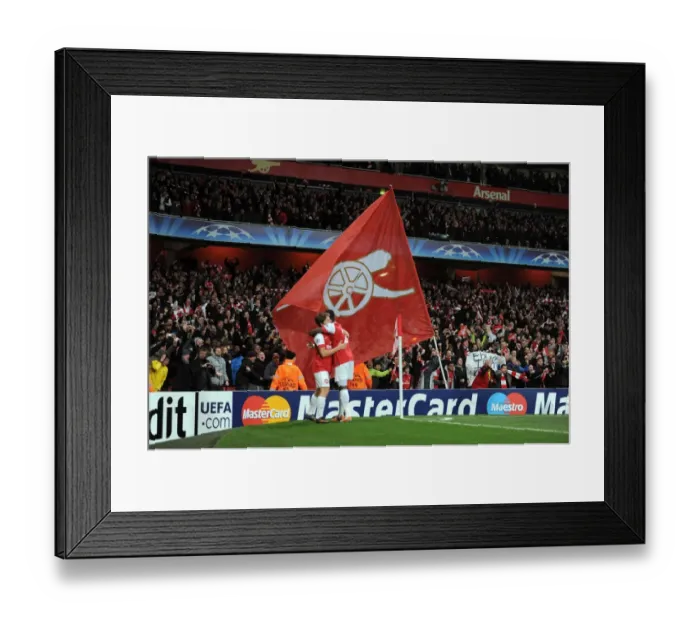 Framed Print : A giant flag is waved following Arsenals 2nd goal. Arsenal 2: 1 Barcelona