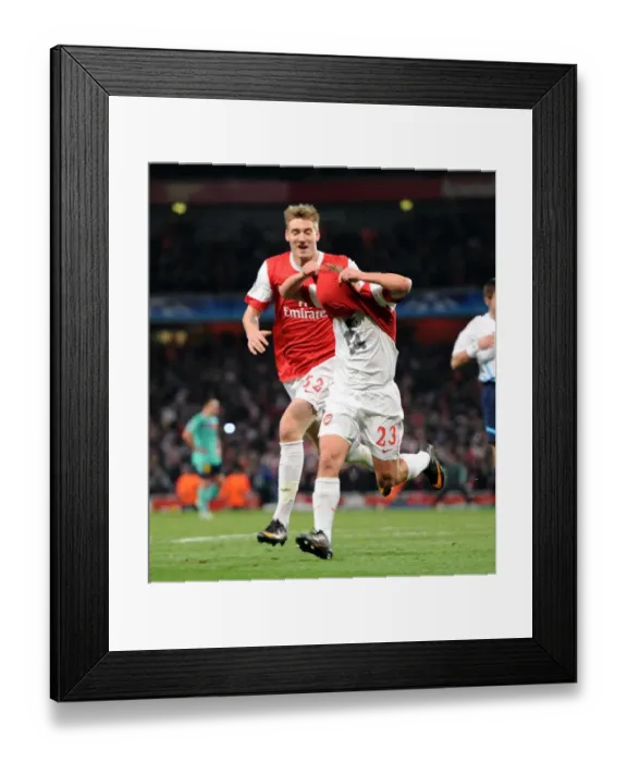 Framed Print : Arshavin and Bendtner: Unforgettable Moment as Arsenal Takes a 2-1 Lead Over Barcelona in the Champions League