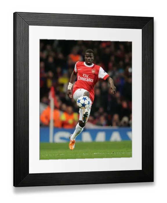 Framed Print : Emmanuel Eboue's Victory: Arsenal 2-1 Barcelona, UEFA Champions League Round 16 (First Leg)