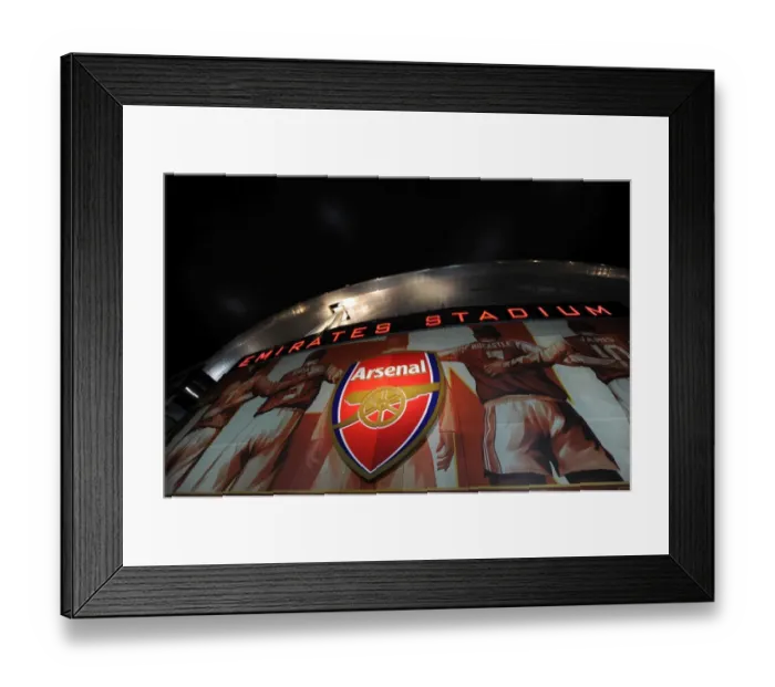 Framed Print : Glowing Emirates: Arsenal's Thrilling 2-1 Victory Against Barcelona in the UEFA Champions League (February 16, 2011)