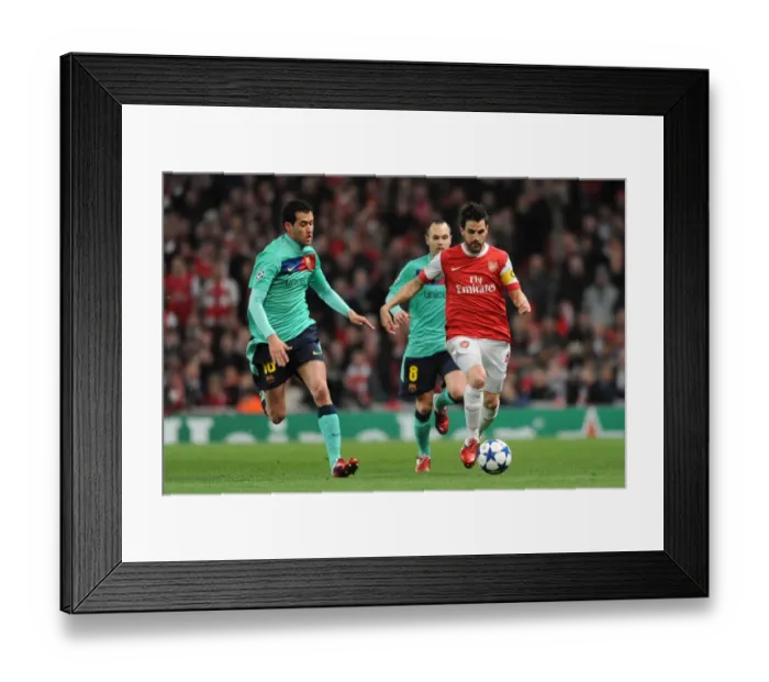 Framed Print : Cesc Fabregas (Arsenal) Sergio Busquets (Barcelona). Arsenal 2: 1 Barcelona