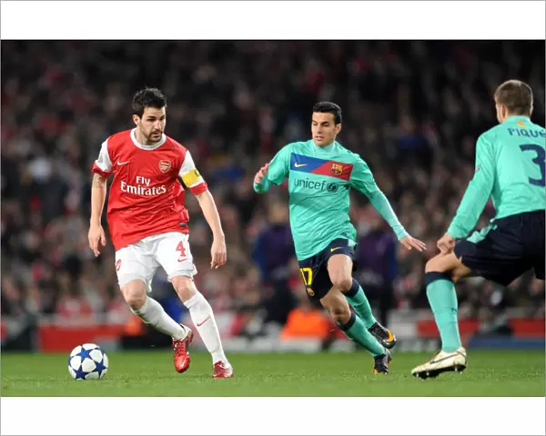 Cesc Fabregas (Arsenal) Pedro Rodriguez and Gerard Pique (Barcelona). Arsenal 2