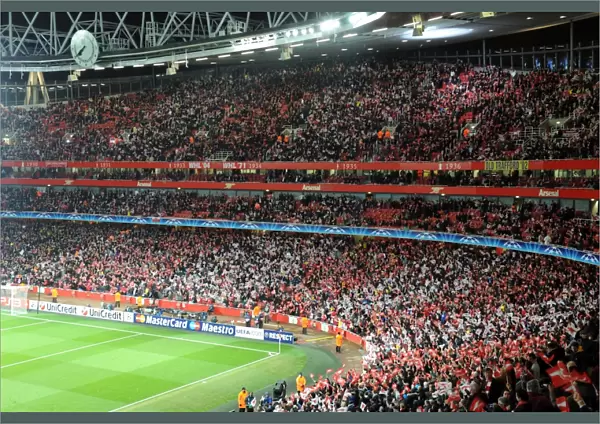 The Arsenal fans wave their flags before the match. Arsenal 2: 1 Barcelona