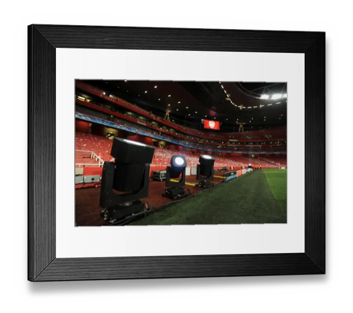 Framed Print : Champions League Showdown: Arsenal vs. Barcelona at Emirates Stadium - Arsenal Leads 2:1