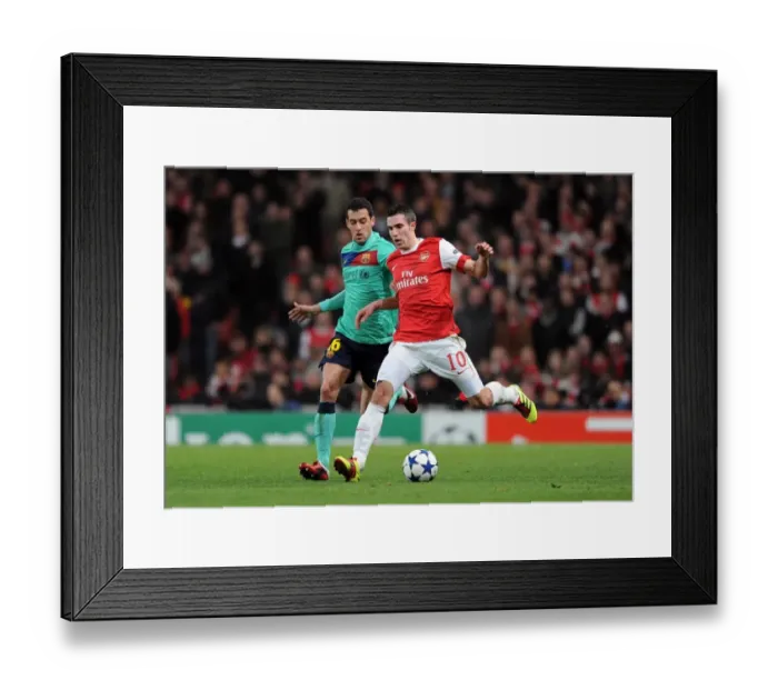 Framed Print : Arsenal vs Barcelona: Robin van Persie vs Sergio Busquets - Arsenal Leads 2:1 in UEFA Champions League Framed Print : Arsenal vs Barcelona: Robin van Persie vs Sergio Busquets - Arsenal Leads 2:1 in UEFA Champions League